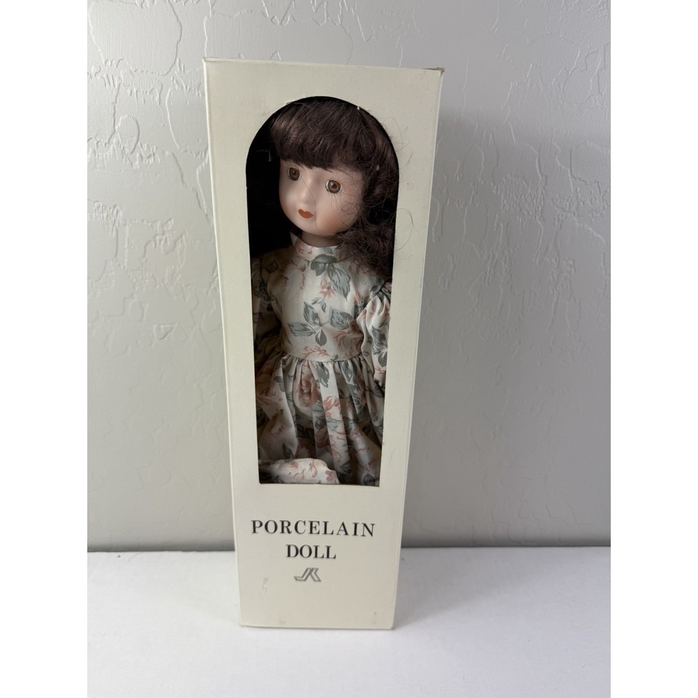 VTG brunette porcelain doll in flower dress, IN BOX